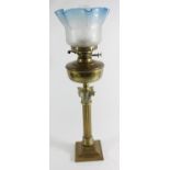 A Victorian brass Corinthian column oil lamp, with Eltex and Duplex adjusters, blue tinged acid