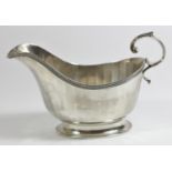 A silver gravy boat, by Adie Bros., Birmingham 1935, Silver Jubilee duty mark, with fluted