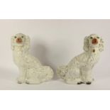 Two 20th century Staffordshire Pottery Spaniels, 31 x 30cm