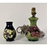 A Moorcroft Hibiscus vase 14cm, paper label to base "By Appointment Moorcroft Potters To The Late