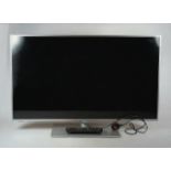 A Panasonic (TX-L39E6B) 39 inch TV, with remote