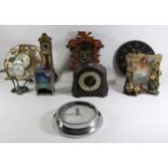 A collection of mid 20th Century and later mantle clocks, carriage clocks and wall clocks (5)