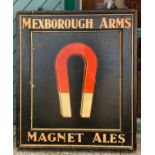A double sided pub sign, from the Mexbrough Arms, Leeds, depicting a horseshoe shaped magnet,