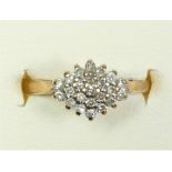 A 9ct gold and diamond cluster ring, set with single cut stones, stated weight 0.20cts, M 1/2, 2.2gm