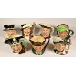 A collection of seven large Royal Doulton character jugs, to include - Porthos, Beefeater, Aramis,