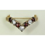 A 9ct gold garnet and white stone V shape ring, S, 1.7gm