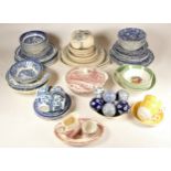 A large collection of blue & white Willow Pattern dinnerware, to include lidded tureens, meat