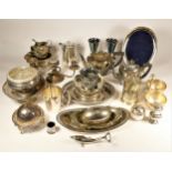 A large collection of plateware, to include candle sticks, fruit bowls, tureens, platters, tea