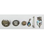 A Victorian silver sentimental brooch, Birmingham 1890, in the form of a basket of flowers and