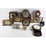 A collection of early 20th Century and later manual wind and Quartz mantle/carriage clocks (4)