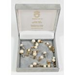 9 pairs of gold mounted cultured pearl ear rings