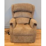 An electric recliner armchair, upholstered in a beige coloured floral chenille fabric. W83cm,