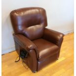 An electric brown faux leather recliner/riser armchair, retailed by Oak Tree Mobility, complete with