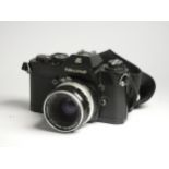 A Nikon Nikomat EL SLR camera, with a Nikkor-H auto 50mm f2 lens, a Hanimex Automatic MC 35mm f2.8