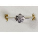 An 18ct gold diamond cluster ring, set with rose cuts, N, 1.7gm