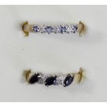 A 9ct gold sapphire and diamond seven stone ring, P and another 9ct gold sapphire and diamond