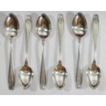A silver set of tea spoons, Birmingham 1928, 74gm, an electroplated revolving bacon dish, a tray and