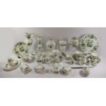 A collection of fourteen Wedgwood "Clementine" bone china pieces to include trinket boxes, spill