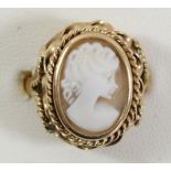 A K18 gold and shell cameo ring, stamped Italy, ornate mount, 21 x 18mm, 6gm