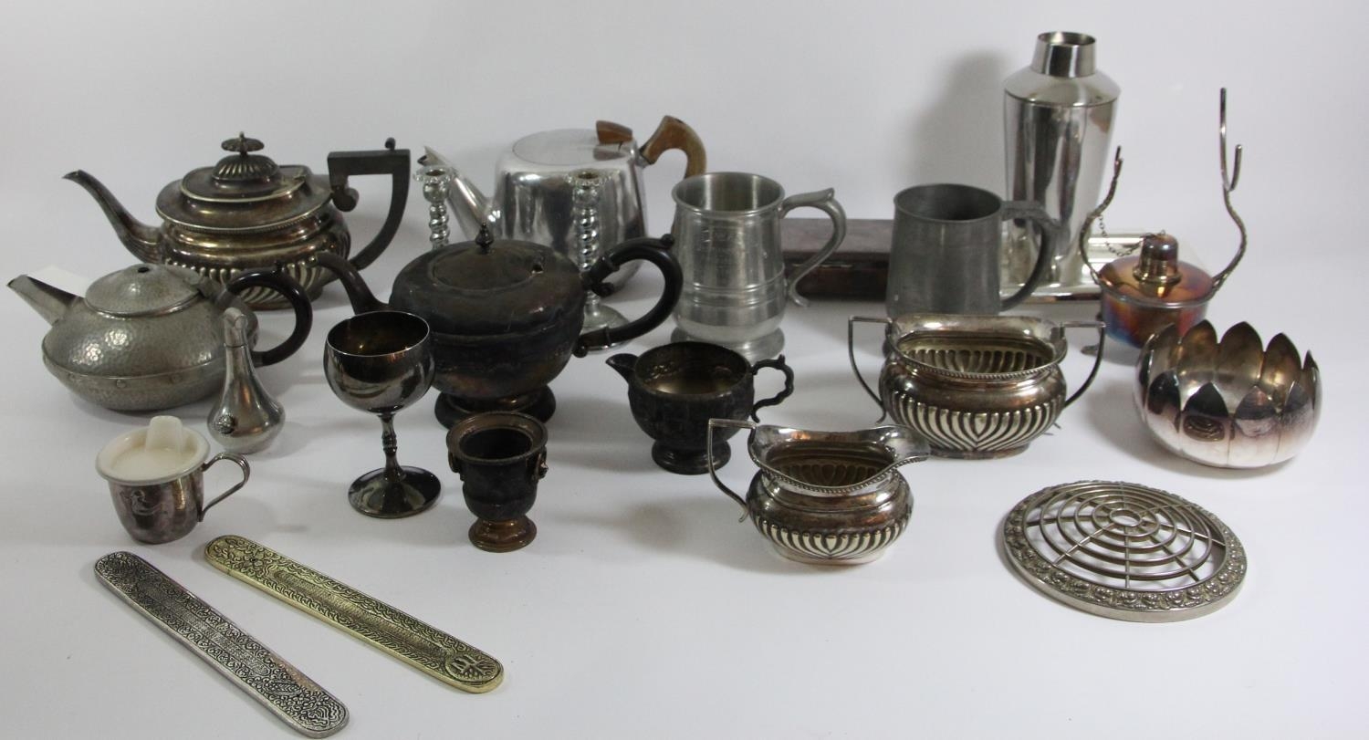 A collection of plated wares to include a coffee service, pewter tea service, cigarette box,