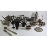 A collection of plated wares to include a coffee service, pewter tea service, cigarette box,