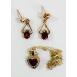 A 9ct gold heart shape garnet pendant, chain and similar ear pendants, 2gm