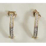 A 9ct gold pair of CZ ear rings, 1.6gm