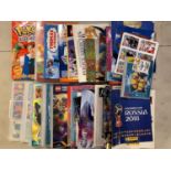 A substantial collection of sticker and trading card holders, sticker packs and trading cards,