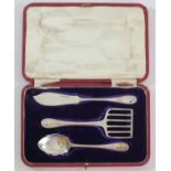 A silver pastry set, by Dixons, Sheffield 1910, comprising pastry slice, preserve spoon and butter