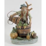 A Capodimonte porcelain figurine of a winemaker, makers mark and signed by the sculptor. 28cm tall.