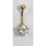 A 9ct gold belly bar, set with a star shape CZ, 3.2gm