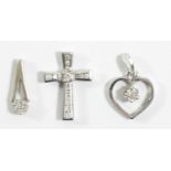 A 9ct white gold and diamond cross pendant, 18mm and two other 9ct white gold diamond set