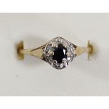 A 9ct gold sapphire and diamond cluster ring, P, 1.8gm