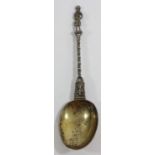 An cast silver gilt figural table spoon, bearing control marks, probably Low Countries, early 19th