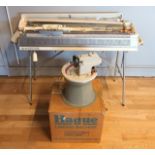 A Brother KR850 ribber for knitting machine complete with stand and attachments to include a Hague