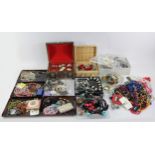 A large collection of ex-shop costume jewellery and accessories, to include bangles, necklaces,