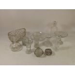 A large collection of glassware, to include cut glass and crystal bowls, vases, drinking glasses,