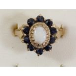 A 9ct gold opal and sapphire cluster ring, O 1/2, 4.2gm