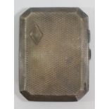 A silver cigarette case, Birmingham 1930, 9 x 6.5 x 1.5cm, 83gm