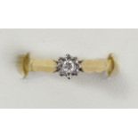 An 18ct gold single stone diamond ring, illusion set with a brilliant cut stone, L, 2.8gm