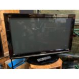 A Panasonic (model TX-P37X10B) 37 inch Viera digital TV, remote and power cable