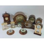 A collection of mid 20th Century and later mantle/wall clocks and barometers (3).