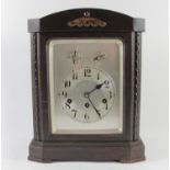 An early 20th Century Junghans Wurttemberg 8 day striking bracket clock, having arched top, silvered