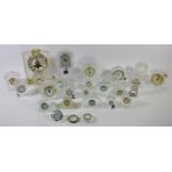 A collection of crystal glass mantle clocks, makers to include - Waterford, Edinburgh, Swarovski and