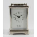 A Woodford Obis 8 day carriage clock chrome plated solid brass casing with beveled edge glass panels