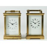 An English 8 day carriage clock brass cased beveled edged glass panels movement stamped "Made in