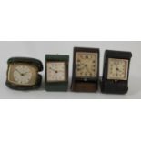 A 1920s Art Deco traveling alarm clock by Jaeger-Le Coultre with eight day movement together with