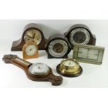 A collection of mid 20th century and later mantle clocks and barometers together with a selection of