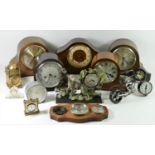 A collection of 1950s mantle clocks to include oak cased Westminster chime, Smiths Bakelite,