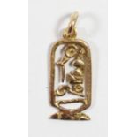 A 14k gold Egyptian charm, 1gm